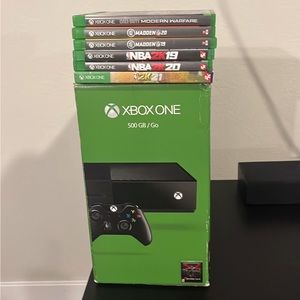 Xbox one X with games and controller